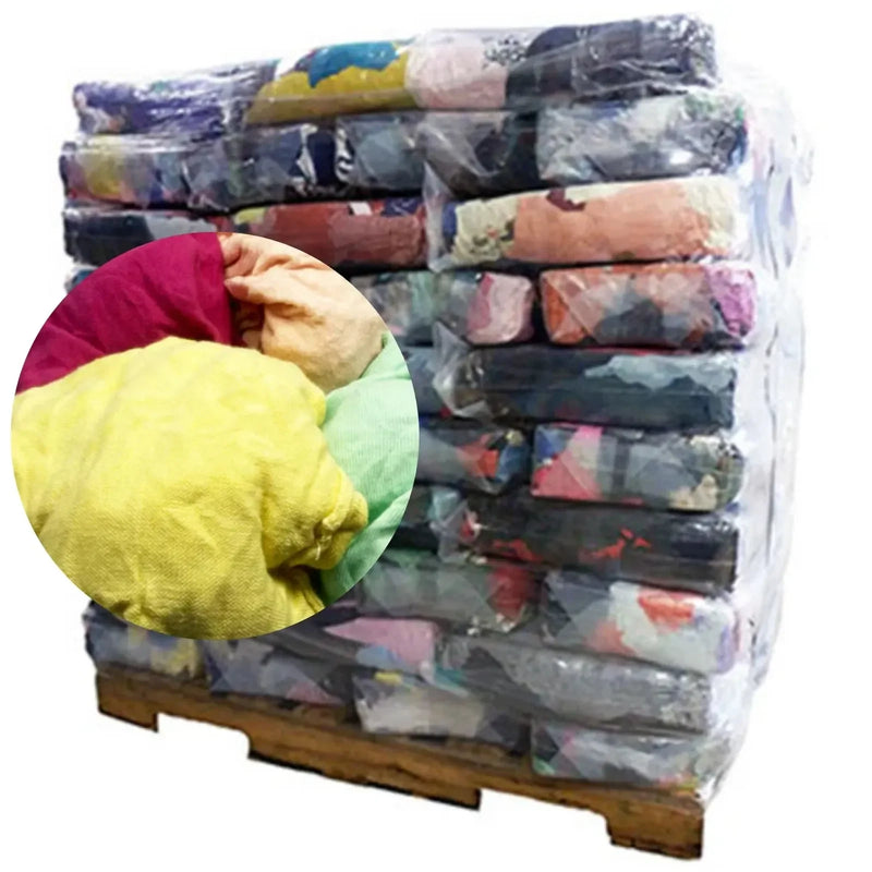 New multi-color washed T-shirt wiping rags on a pallet, 40 bags of 25 lbs each, by Wiping Hub for industrial cleaning use.